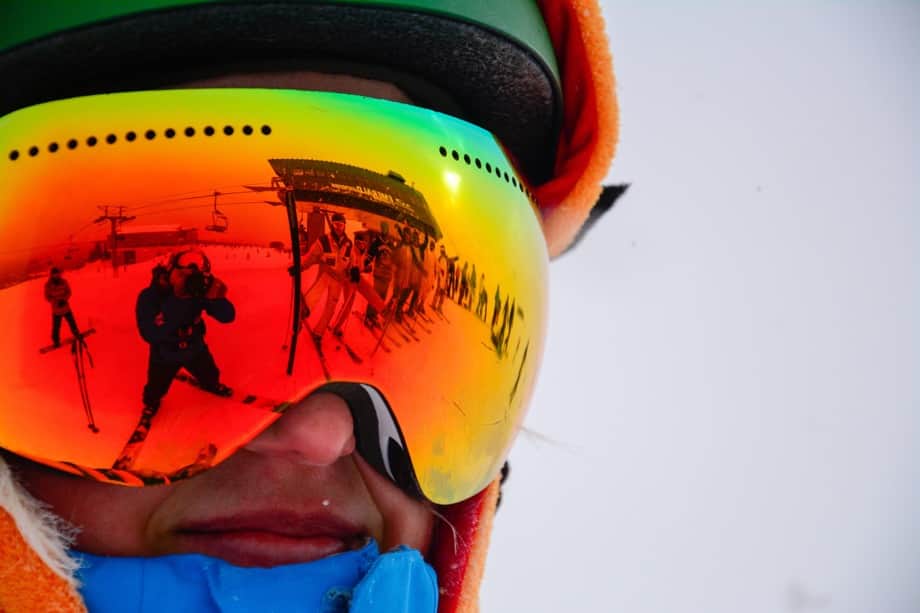 man wearing reflective ski goggles