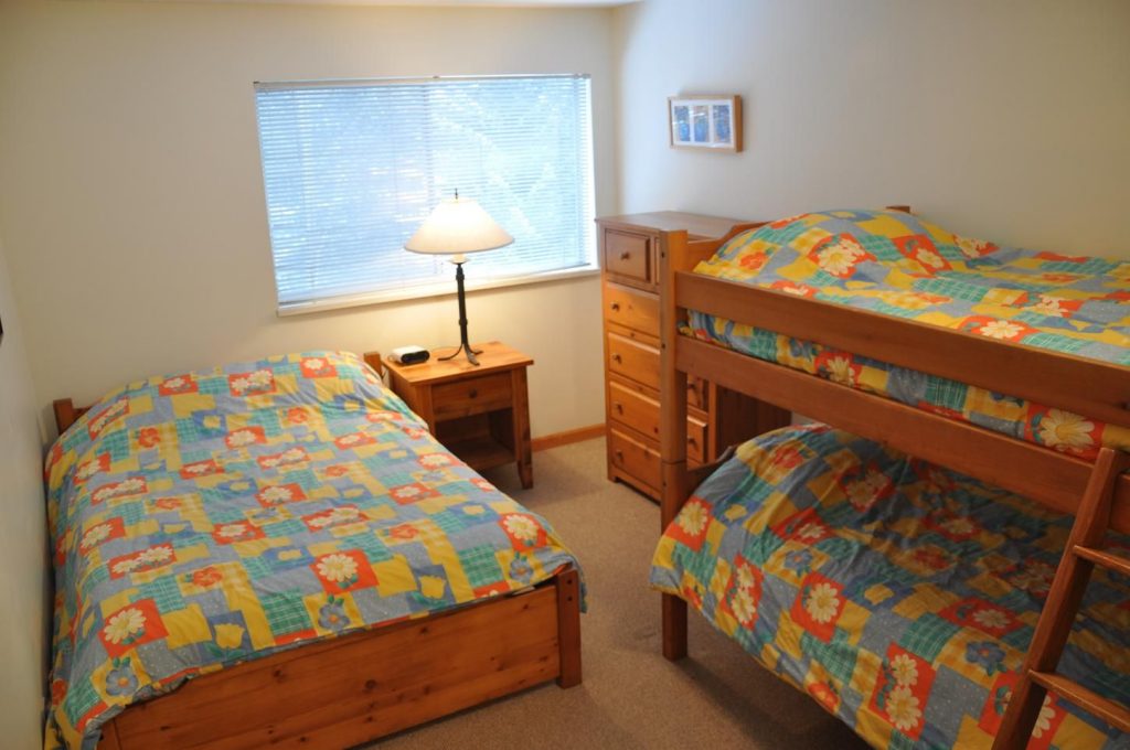 triple bed room with bunk bed
